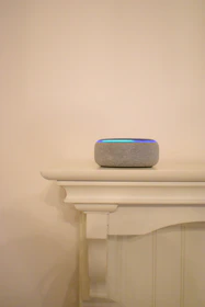 A cozy living room corner featuring a smart home device blending with decor.