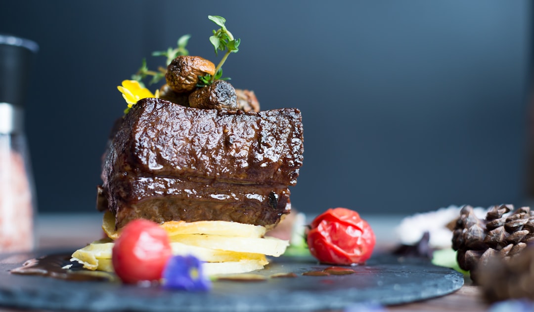 chocolate cake with sliced lemon and strawberry on top