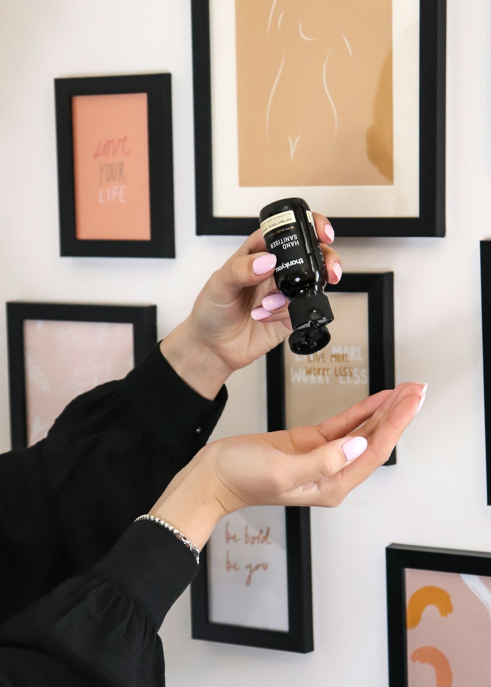 person holding black dslr camera