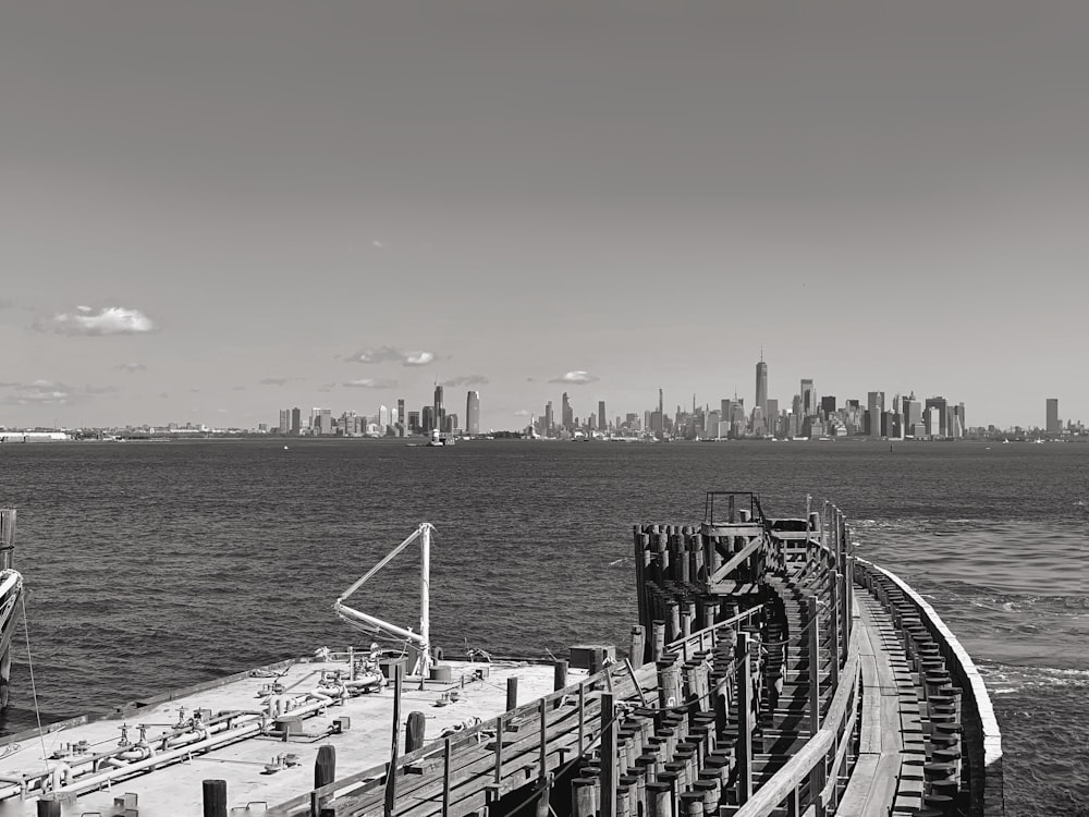 grayscale photo of a boat on a body of water