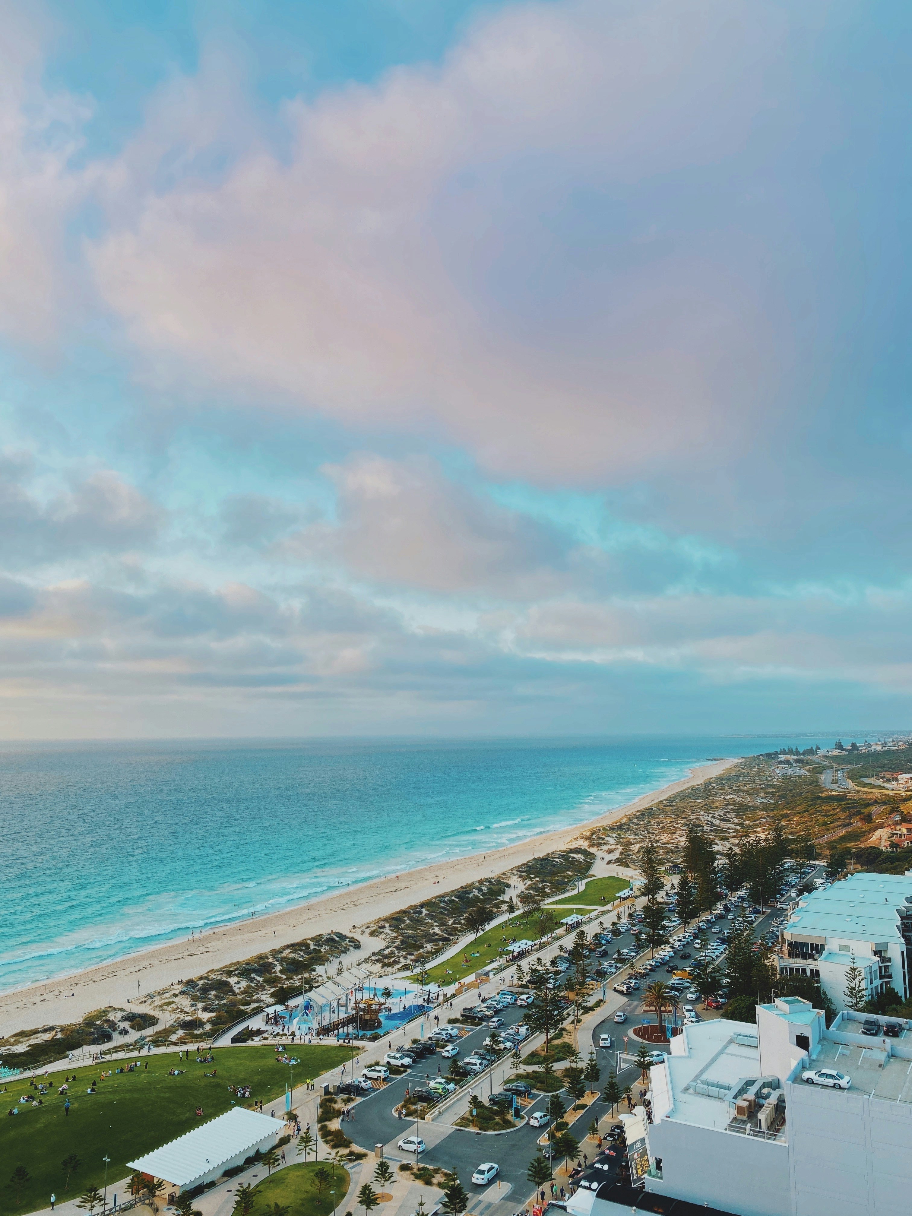 aerial view of city near sea during daytime