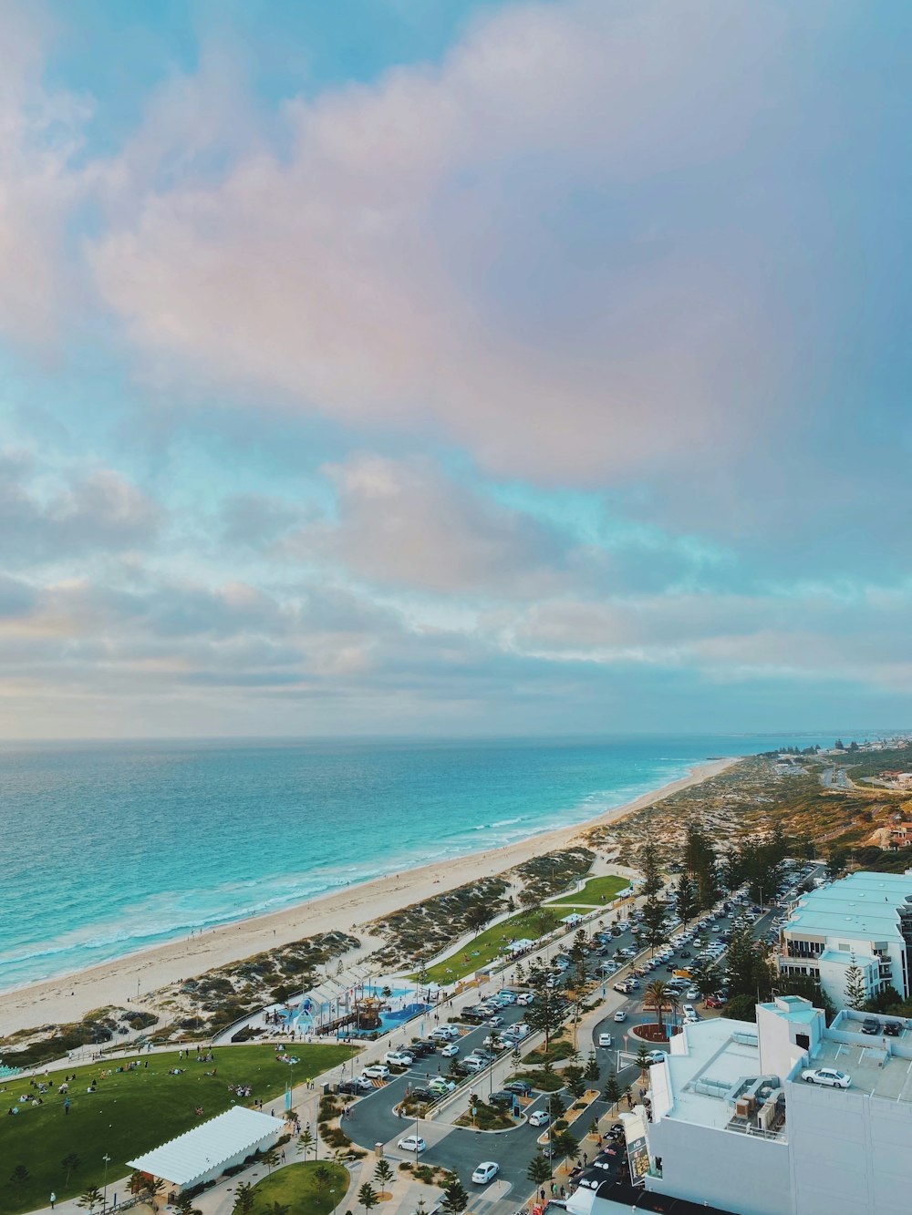 aerial view of city near sea during daytime