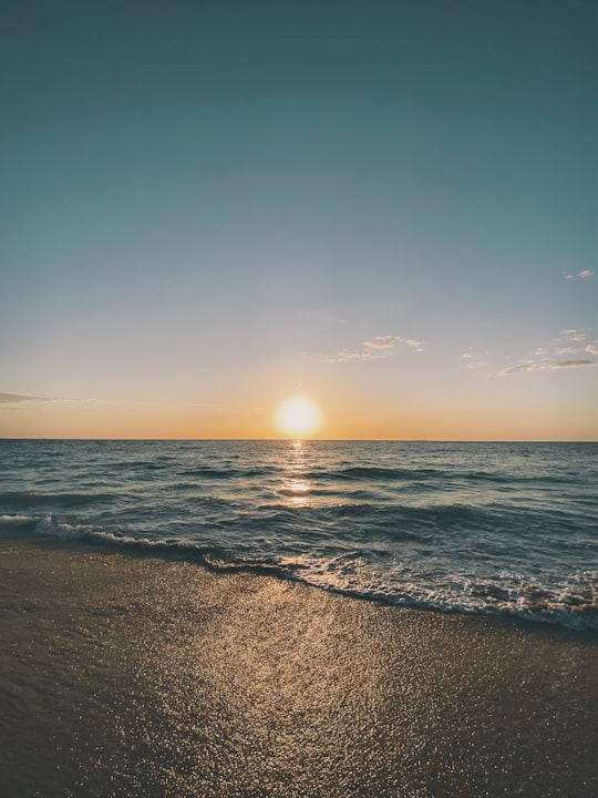 sea waves crashing on shore during sunset in Floreat Beach Australia