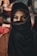 woman in black hijab standing