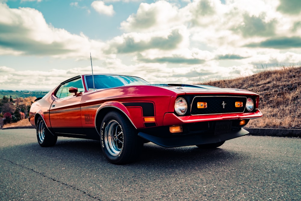 brown and black chevrolet camaro on road during daytime