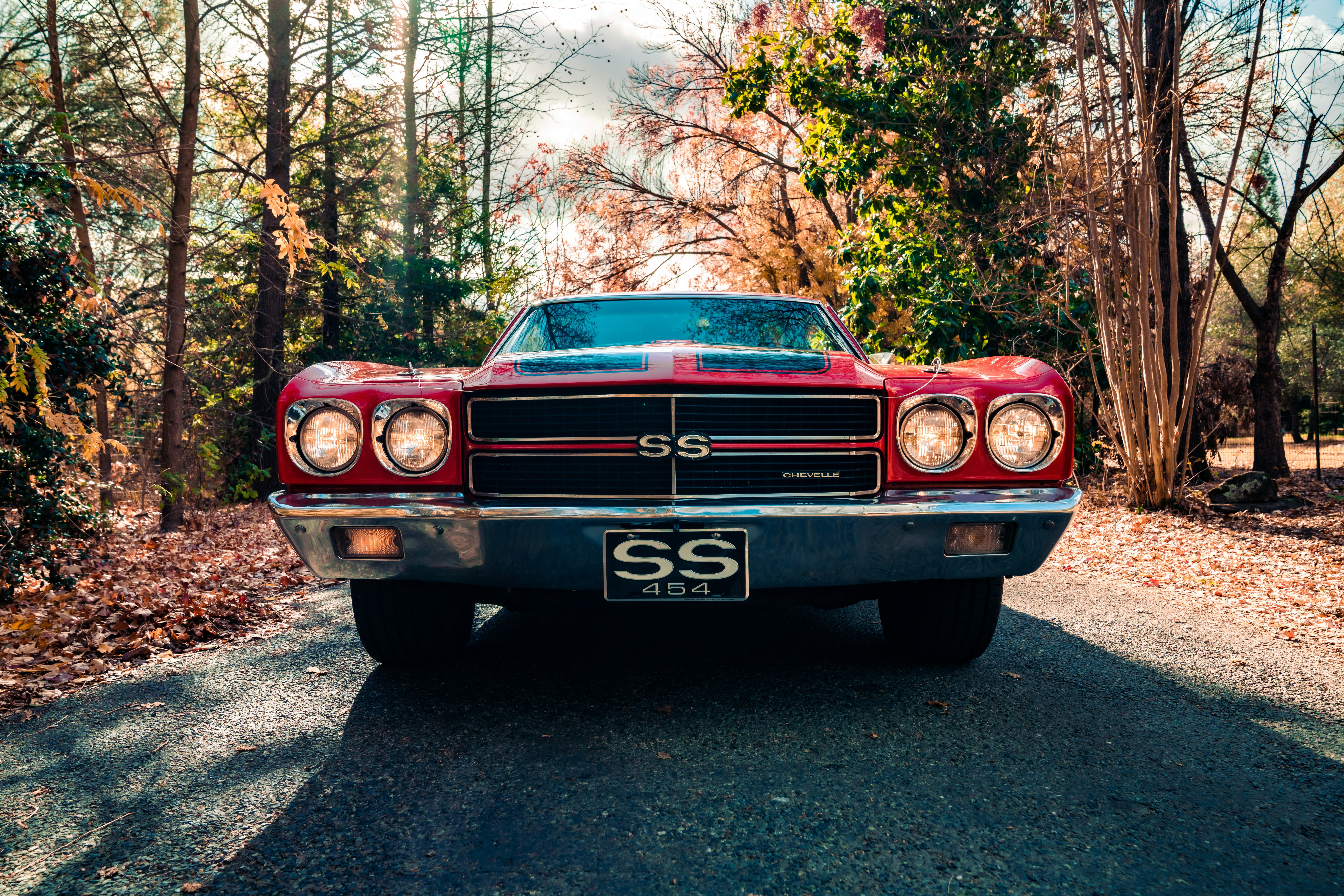 Red and silver chevrolet car parked on the side of the road photo – Free Car  Image on Unsplash, image size:3000x2001