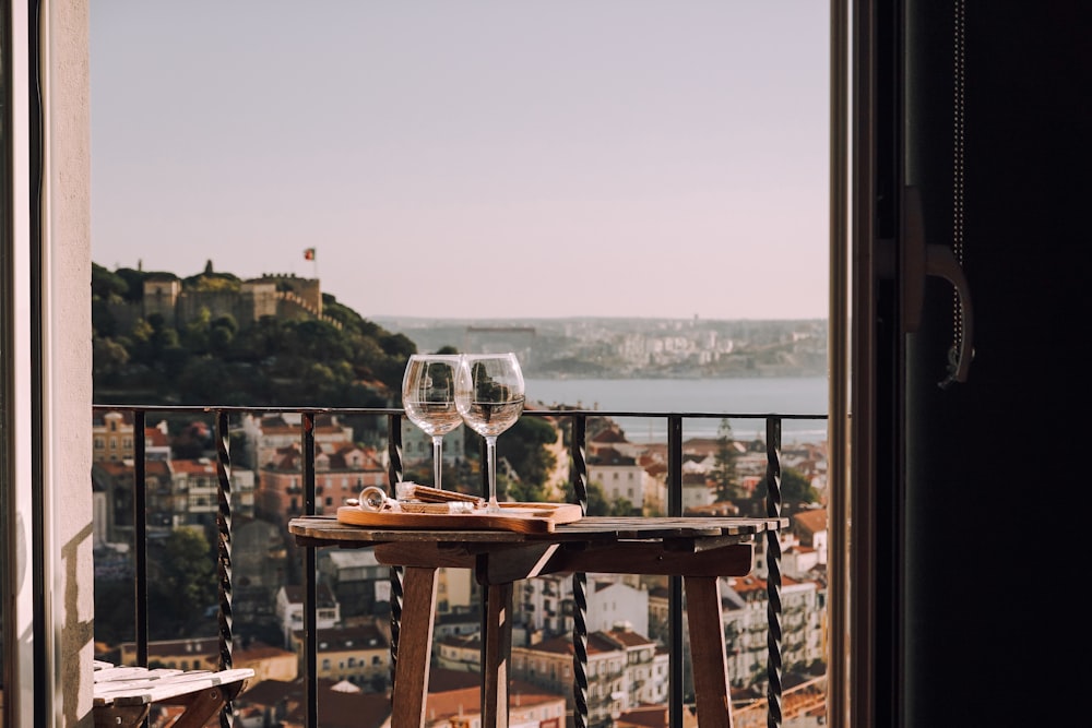 clear glass ball on brown wooden table for date night