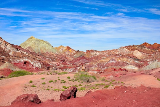 brown and green mountains under blue sky during daytime in Hormuz Island Iran