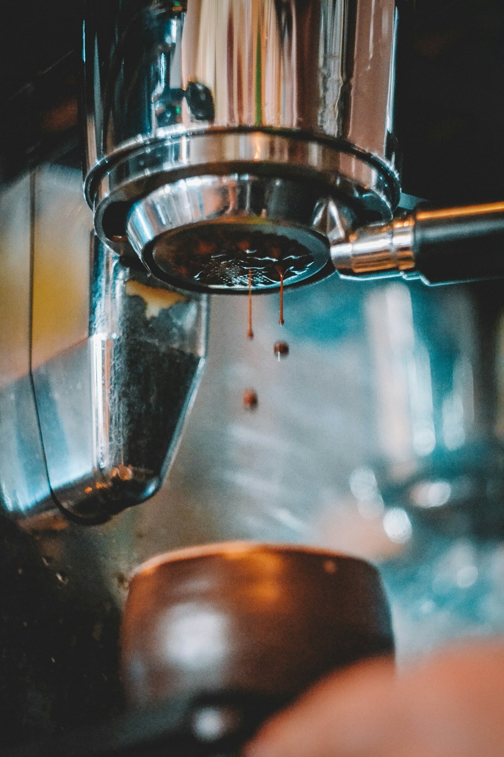 water pouring from stainless steel container