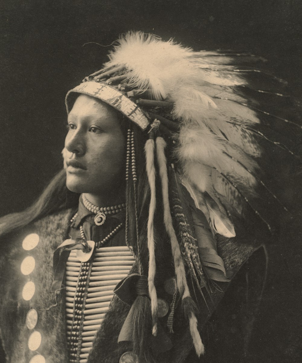 man in black and white fur coat