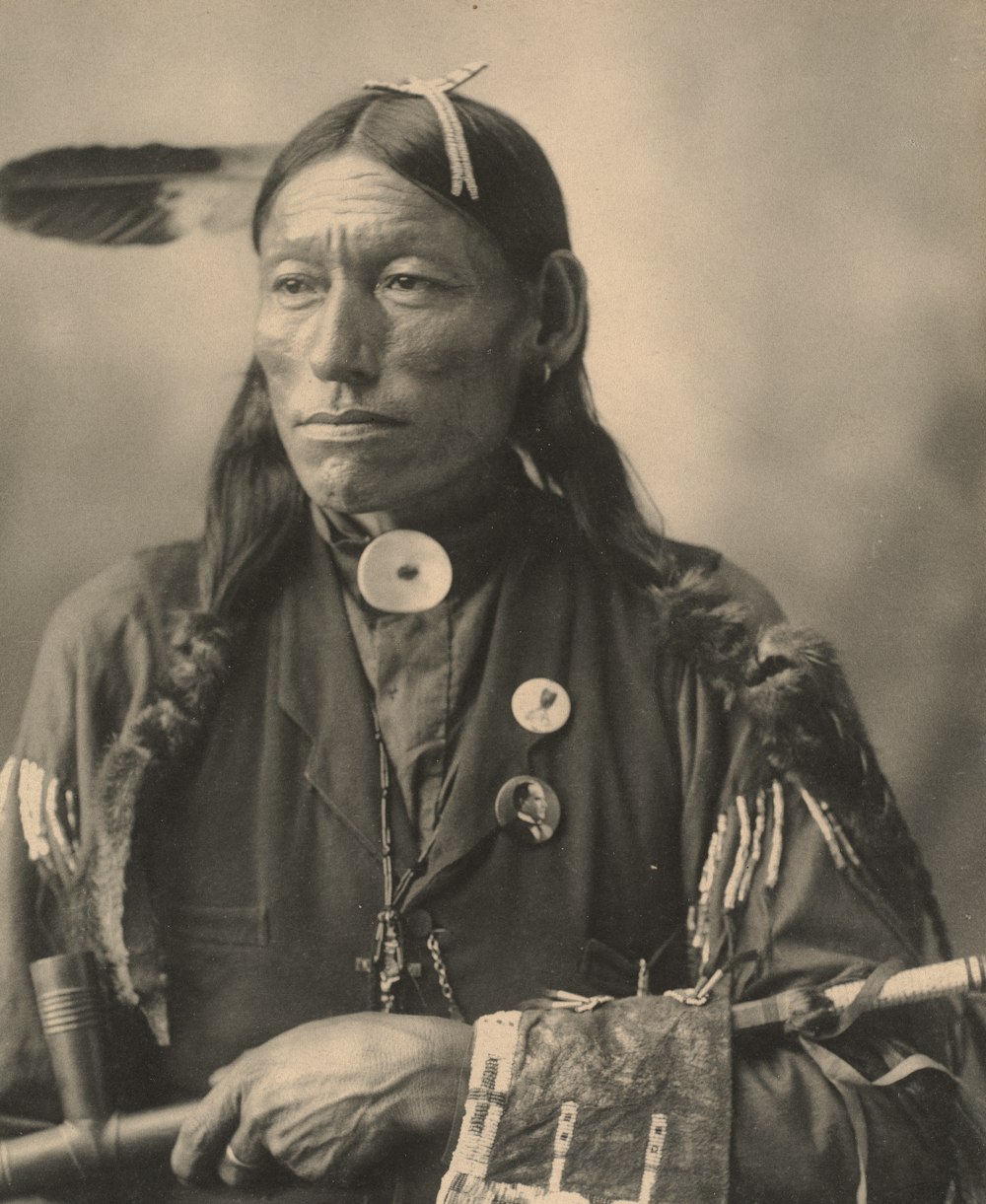 man in black and white hat