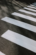 white and black striped textile