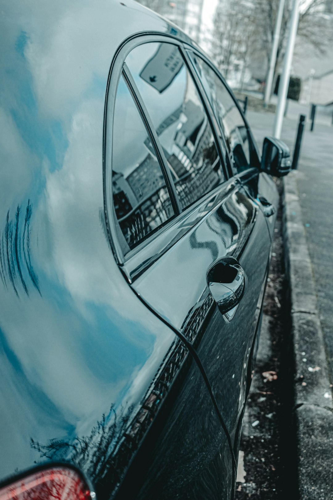 blue car on road during daytime