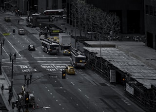 cars parked on the side of the road in the city