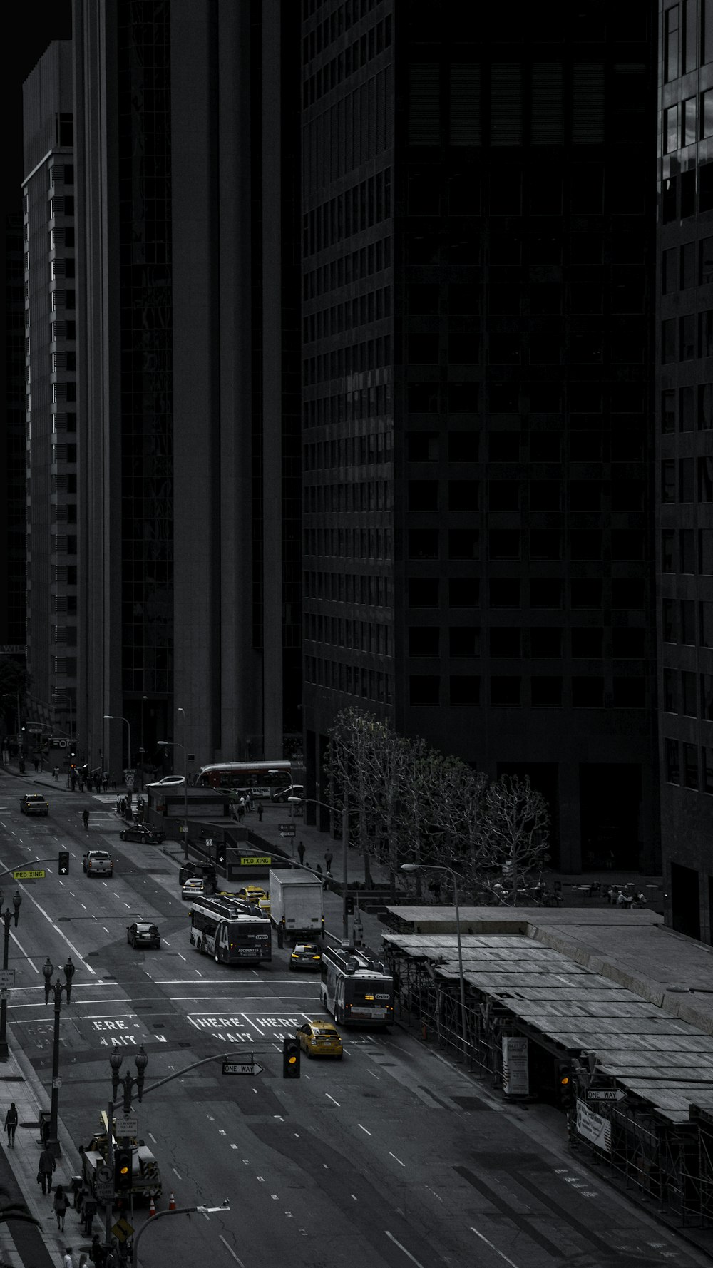 cars parked on the side of the road in the city