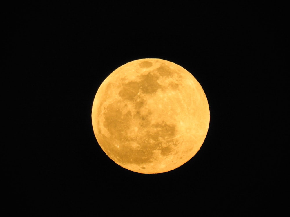 full moon in dark night sky