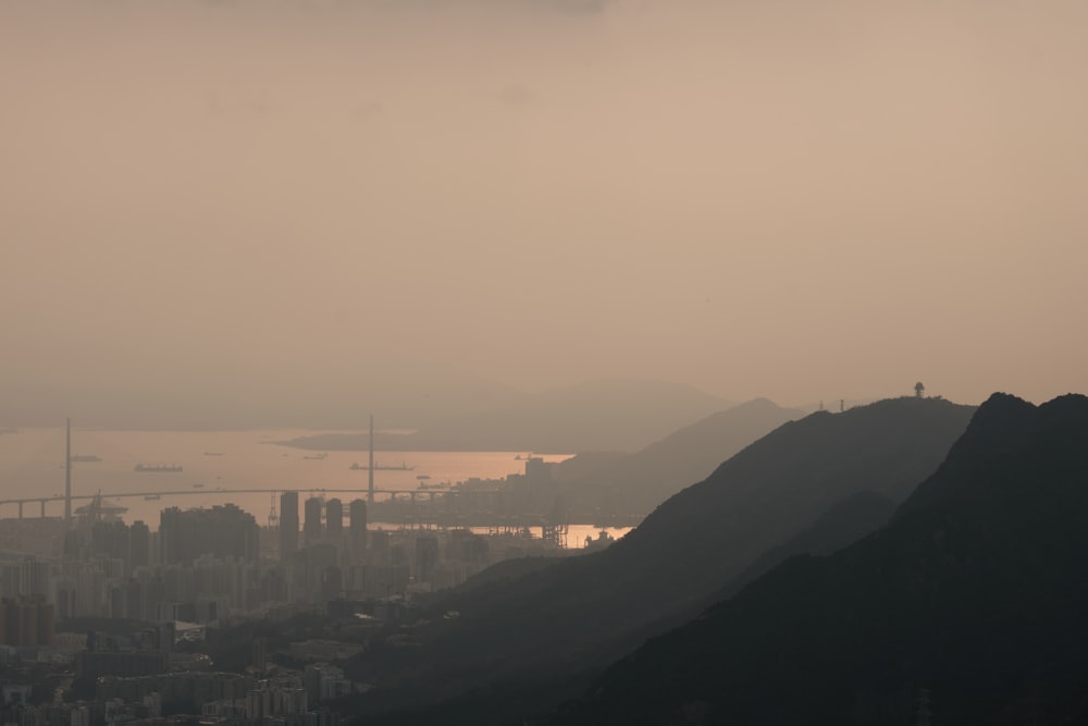 city skyline under white sky during daytime