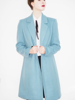 woman in blue blazer and white dress shirt
