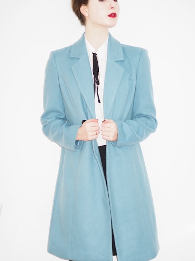 woman in blue blazer and white dress shirt