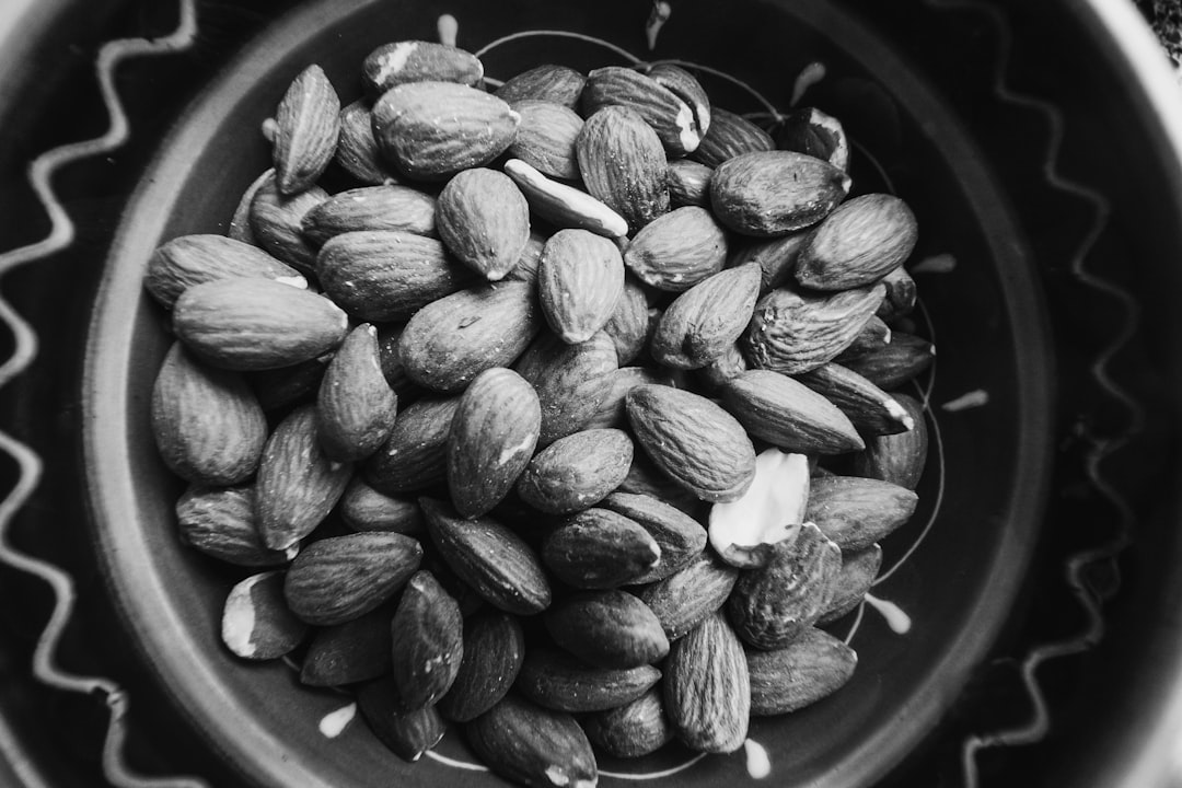 Olive oil, nuts, and fish representing unsaturated fat sources