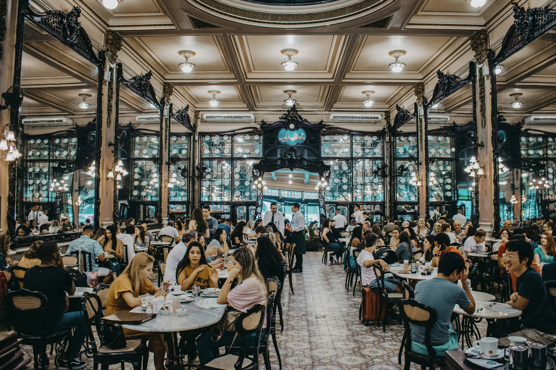 people sitting on chair inside restaurant