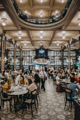 people sitting on chair inside restaurant
