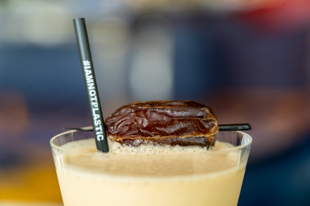 chocolate bar on clear drinking glass