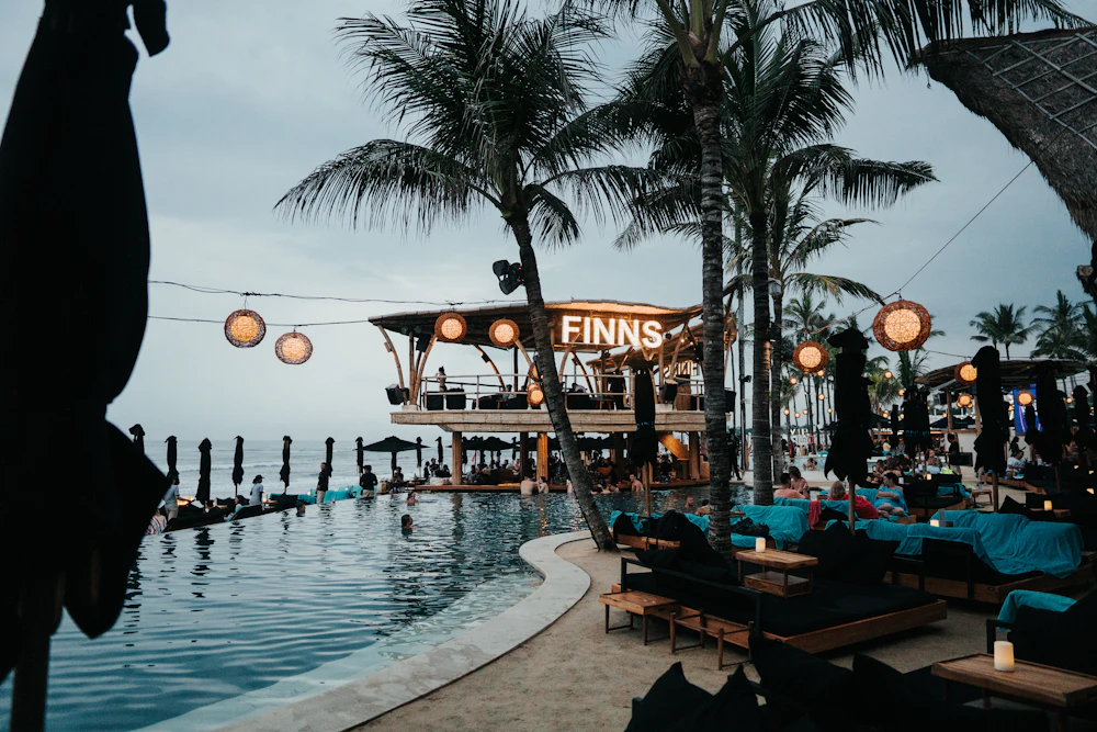 Poolside loungers by the water