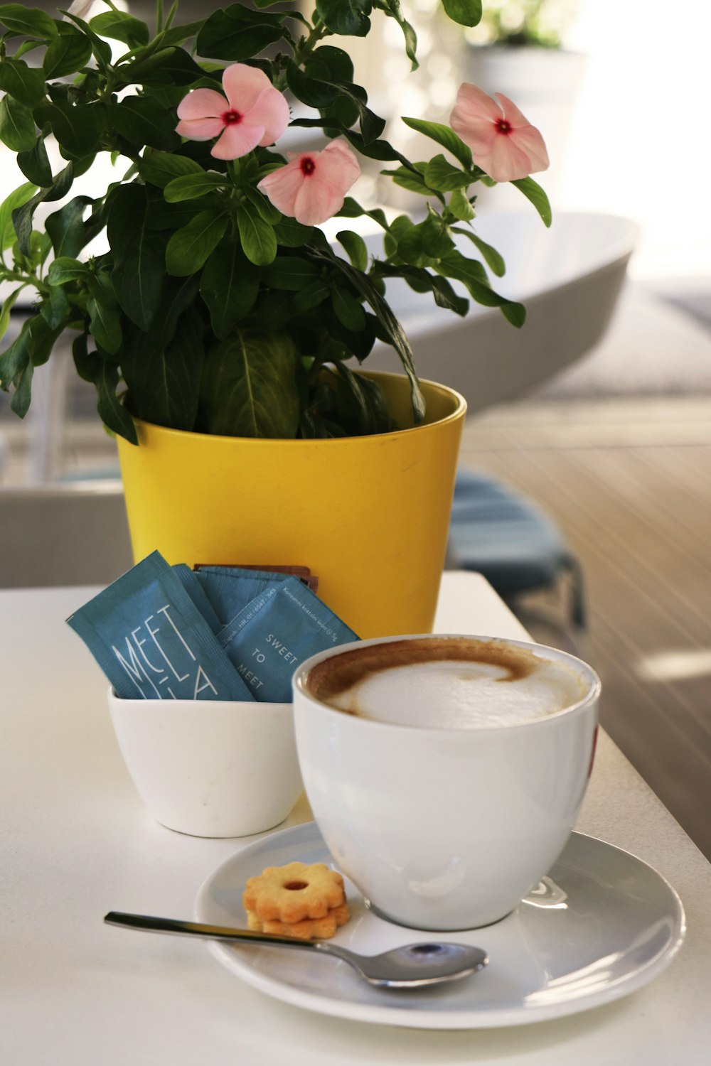 white ceramic cup with coffee