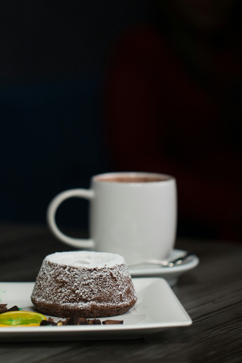 white ceramic mug on white ceramic saucer