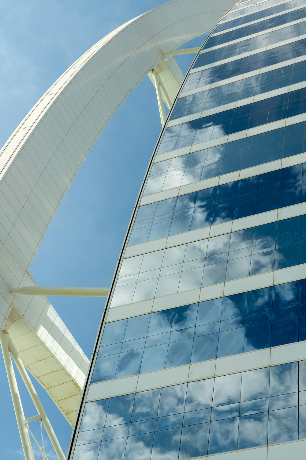 white and blue glass walled building