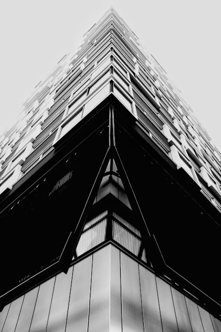 grayscale photo of concrete building