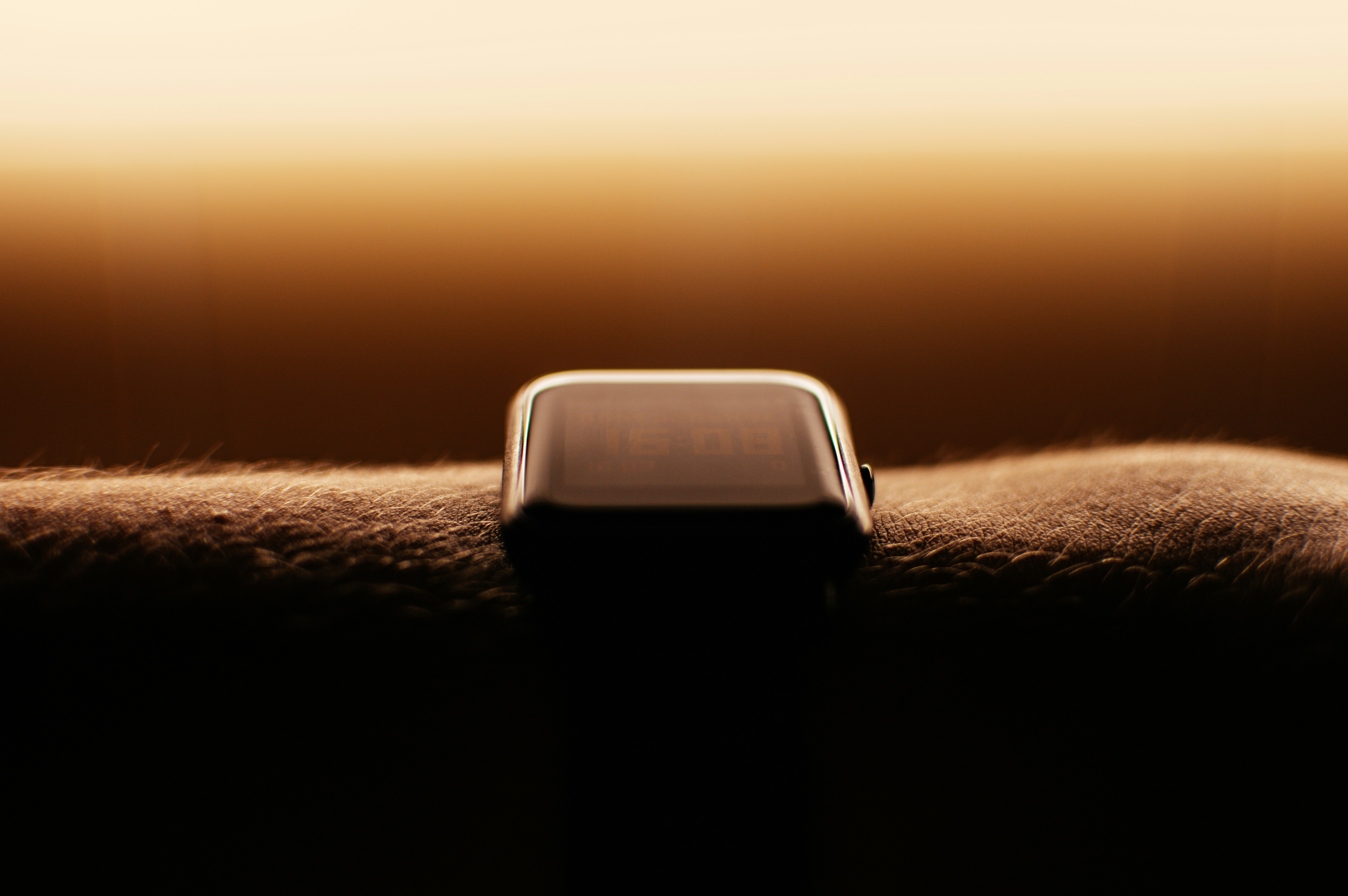 silver aluminum case apple watch with white sport band