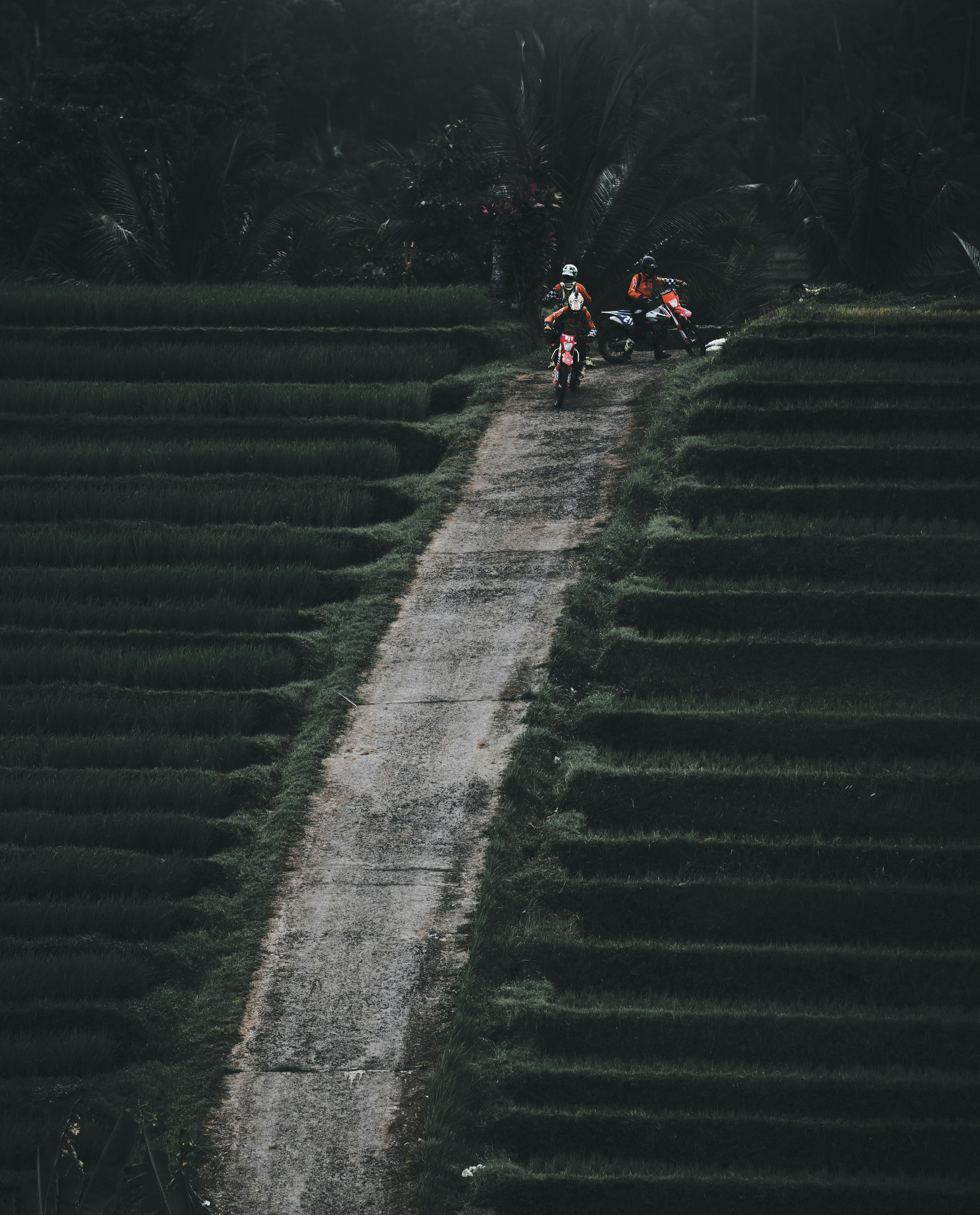 people riding motorcycle on gray concrete stairs