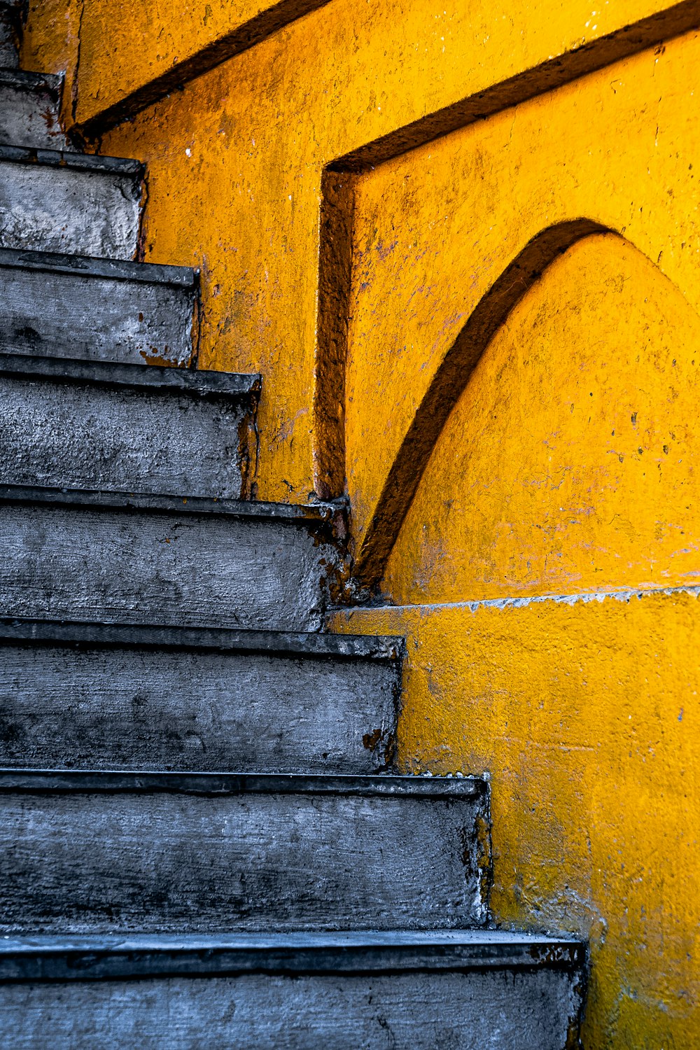 blue and yellow concrete staircase