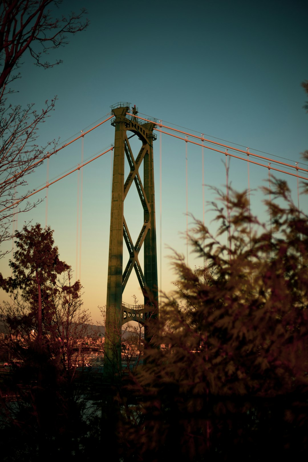 gray steel bridge under blue sky during daytime