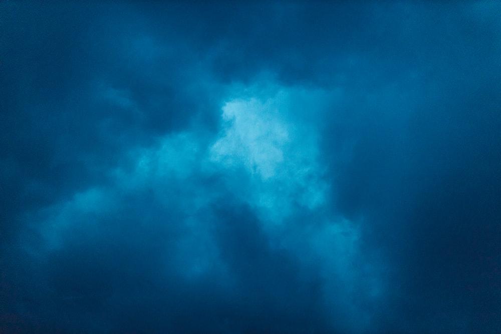 purple and white clouds during night time