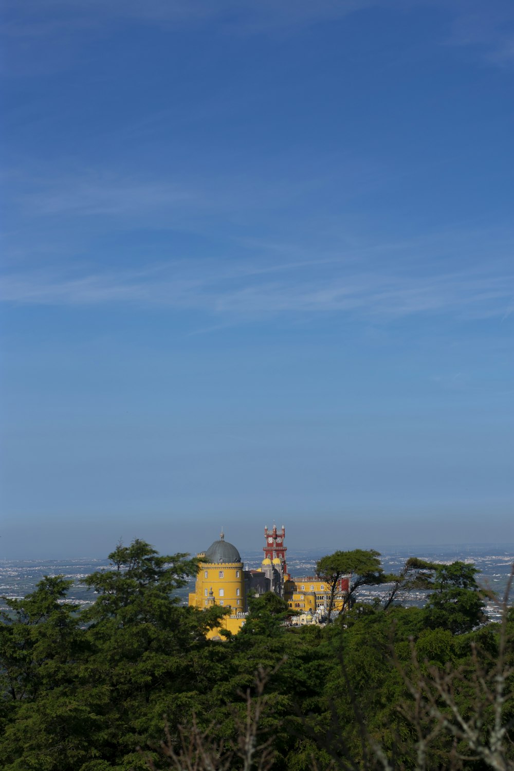 yellow and brown concrete building under blue sky during daytime