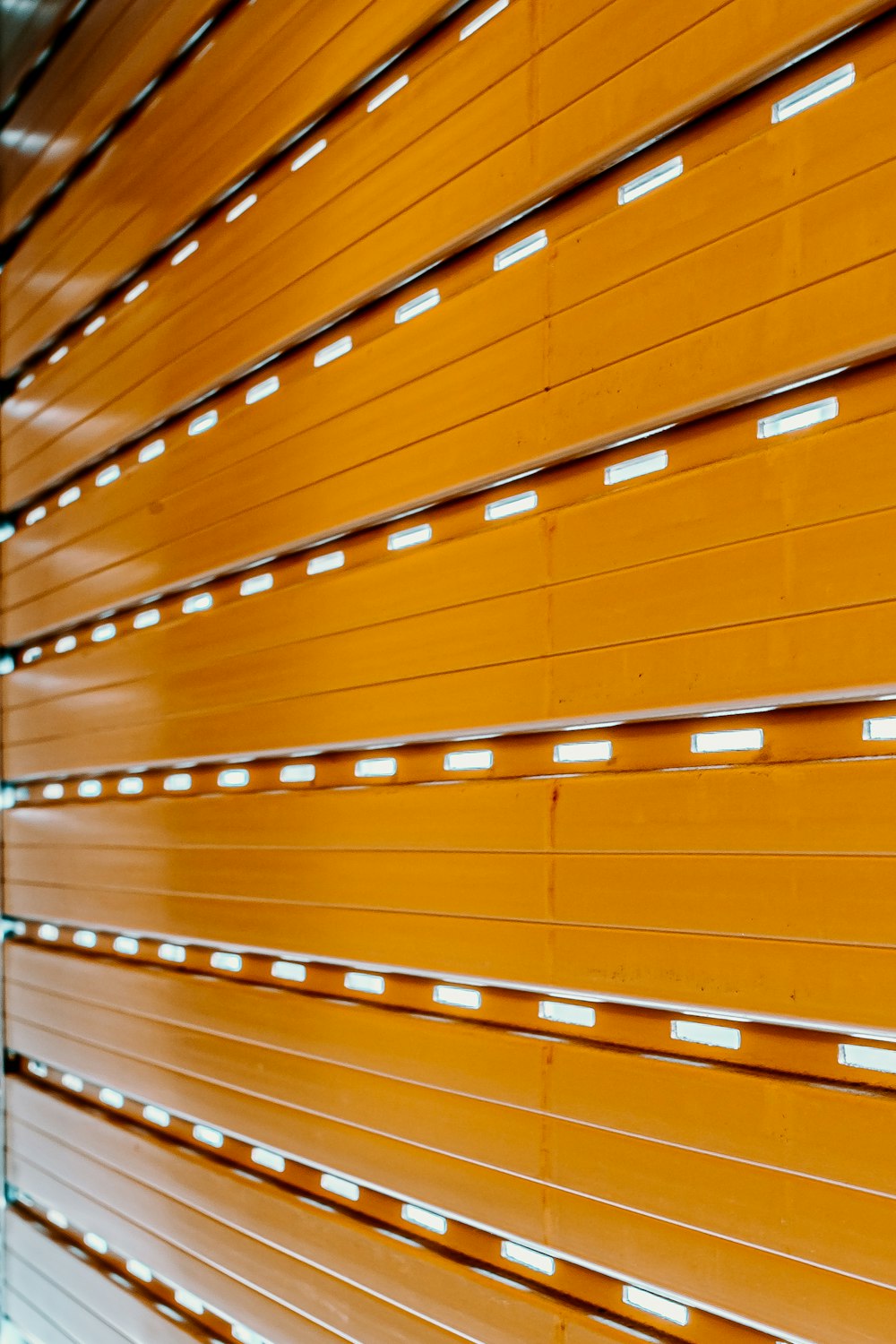 brown wooden ceiling with light fixture