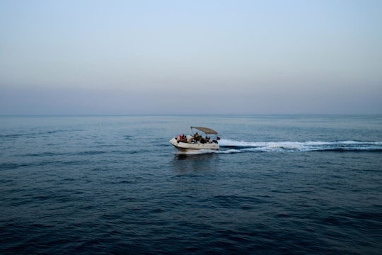 white and black boat on sea during daytime in Ain Sokhna Egypt