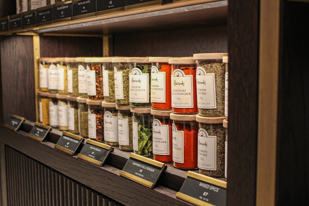 brown wooden shelf with bottles