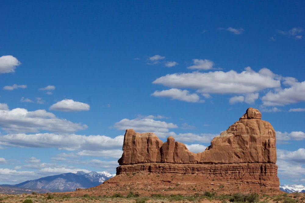 brown rock formation under blue sky during daytime