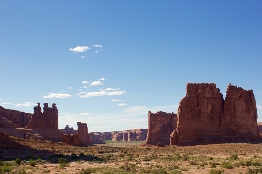 brown rock formation under blue sky during daytime