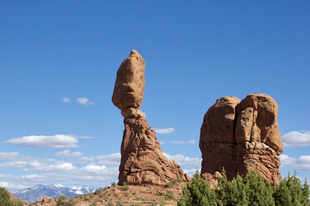 brown rock formation under blue sky during daytime