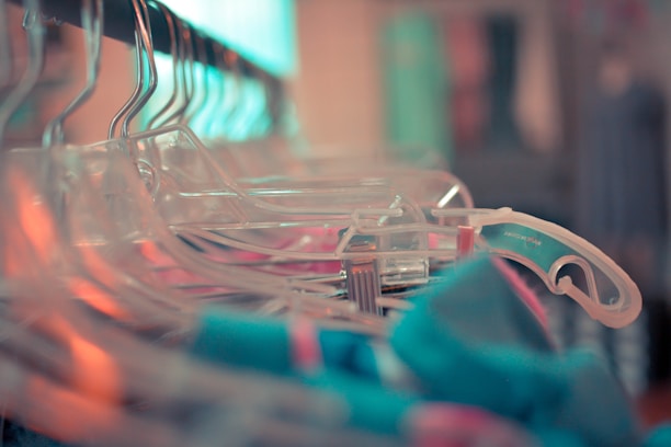 A close-up of a high-quality hanger showcasing a garment.