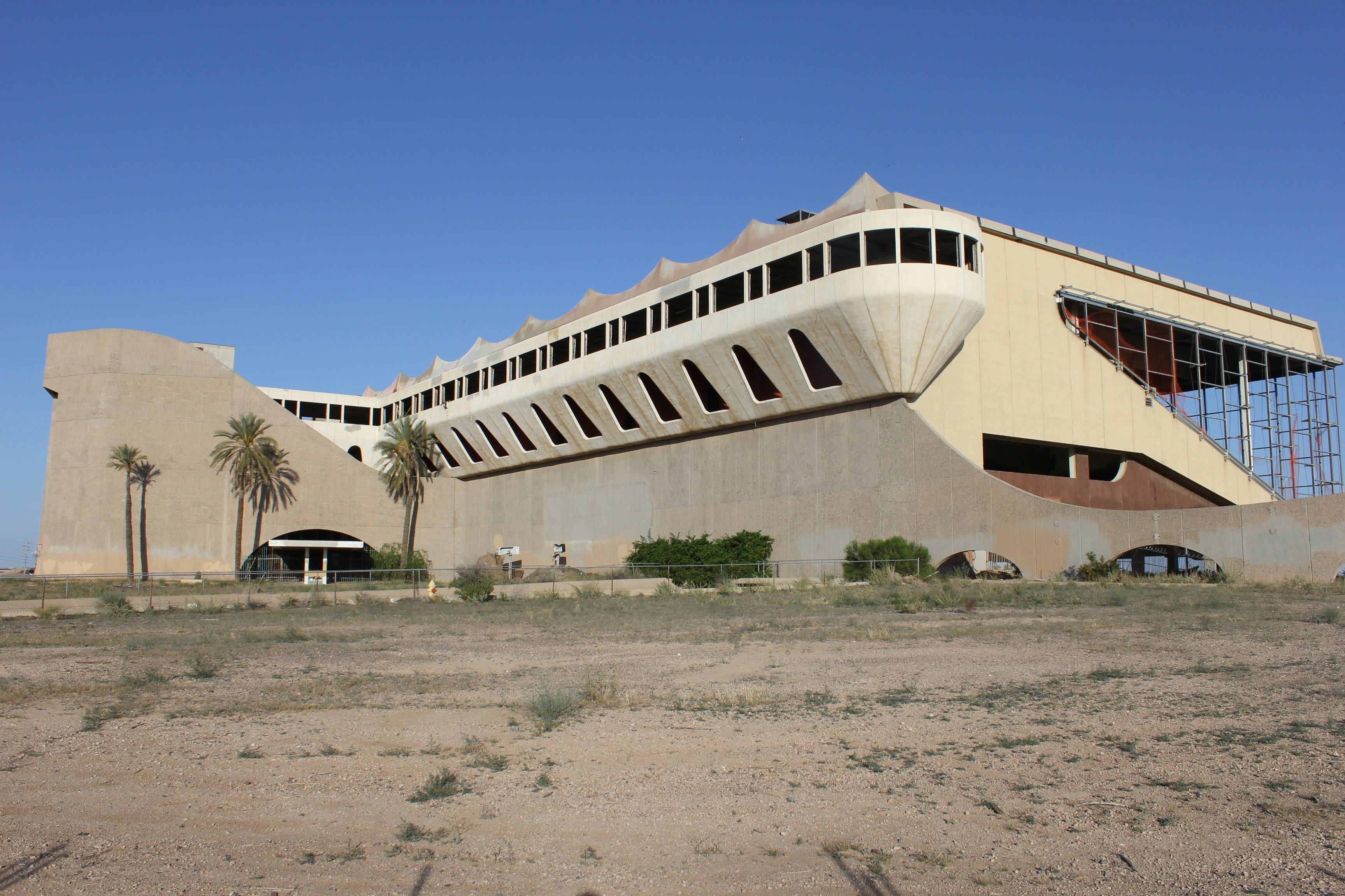 white concrete building under blue sky during daytime