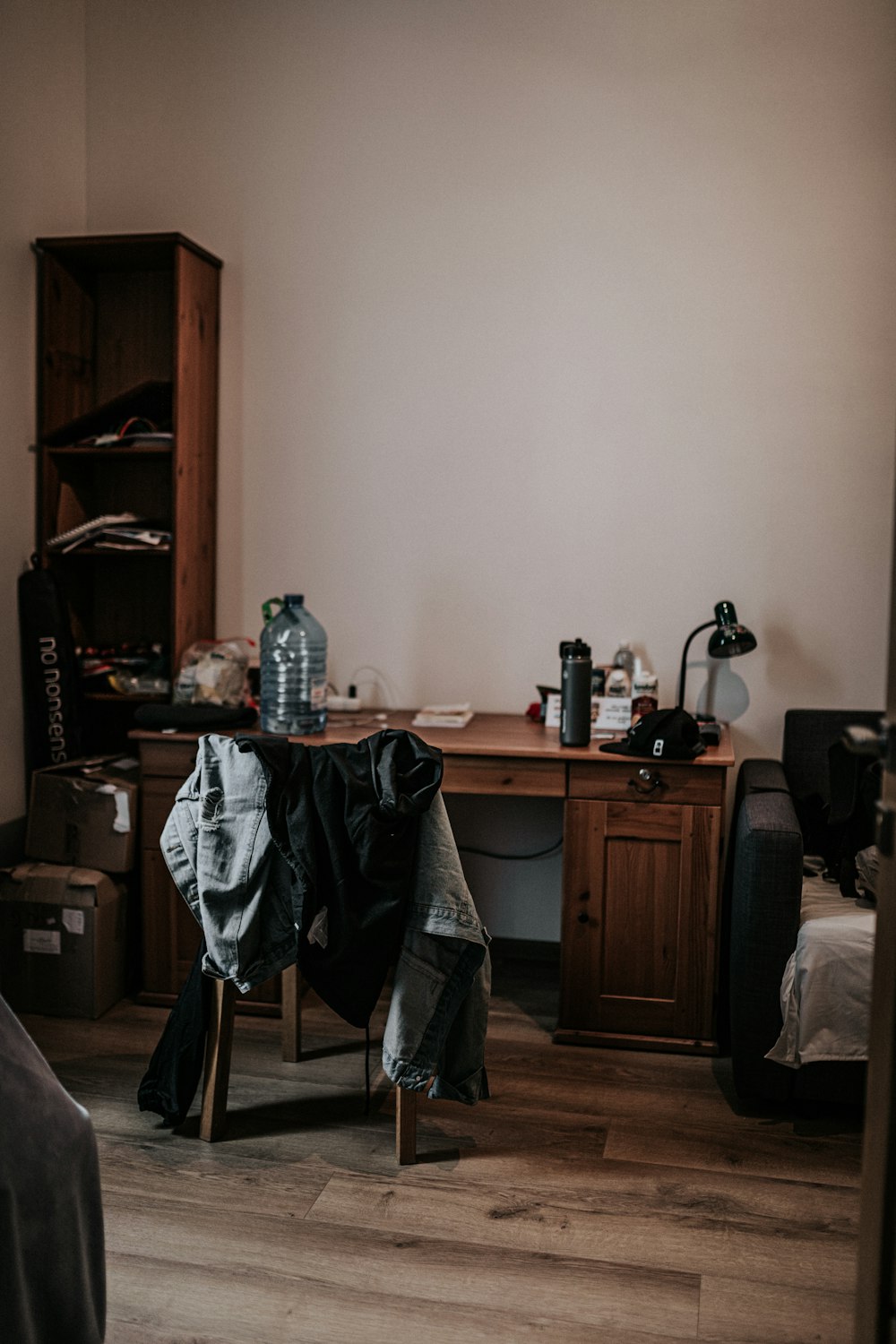 brown wooden cabinet beside brown wooden cabinet