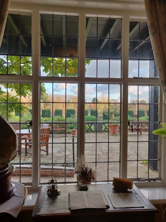 A cozy residential interior showcasing tilt & turn windows with elegant wooden finishes.