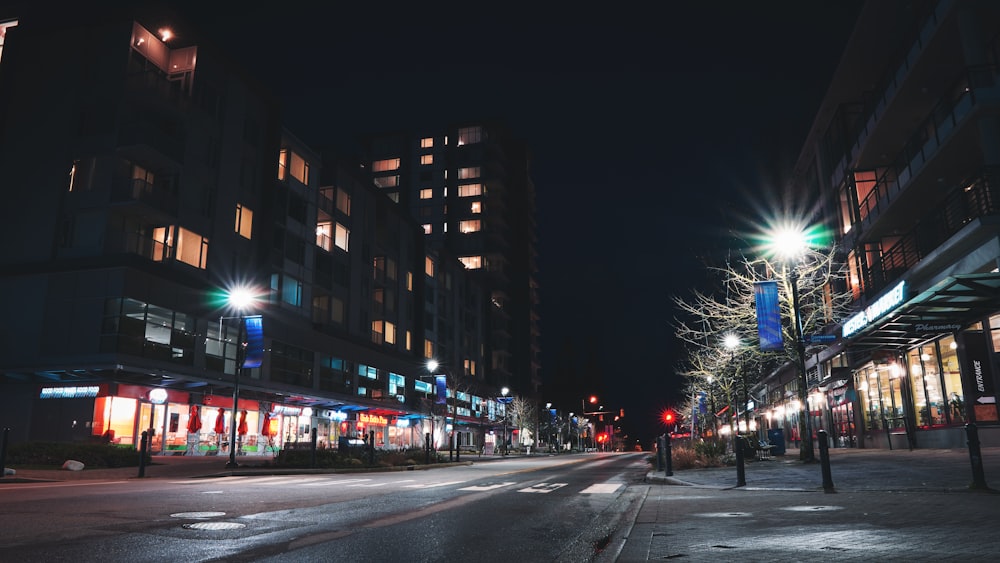 cars on road in city during night time