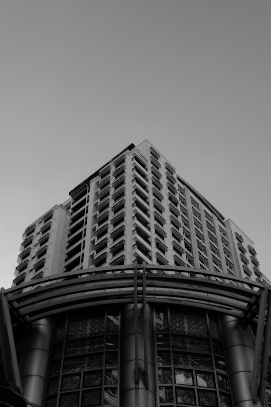 grayscale photo of concrete building in Manila Philippines